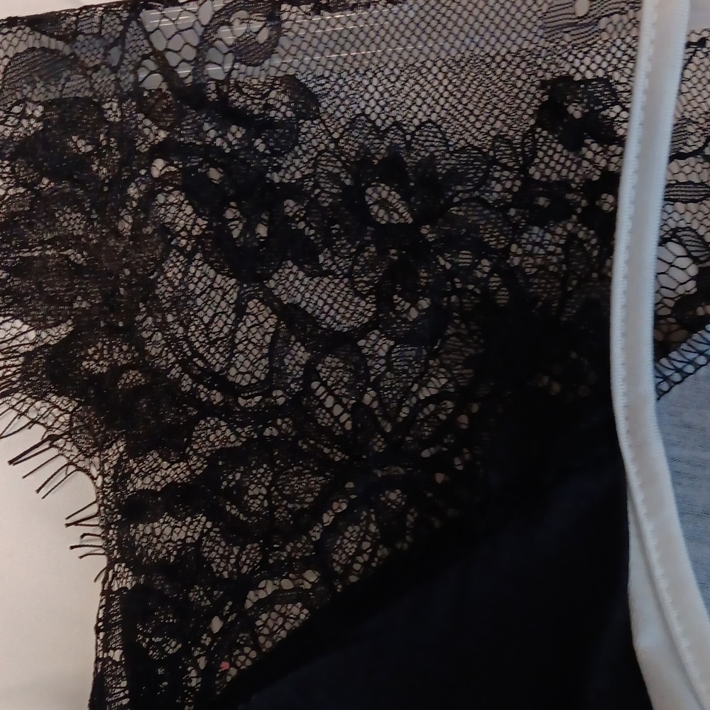 This Lily 1X black dress was worn only once. She is dainty w/lace sleeves.